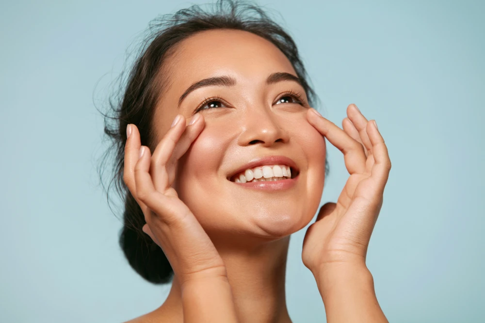 Woman with radiant skin after med spa facial treatment.
